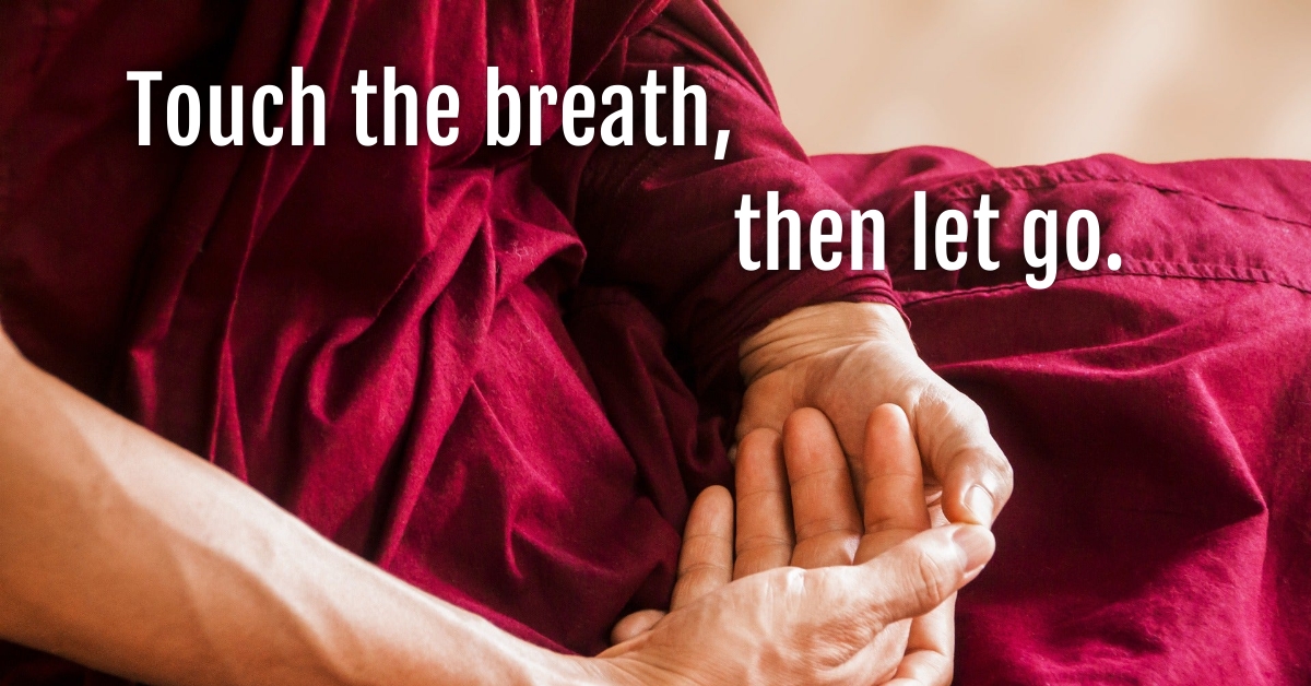 Photo: close-up of monk with the words, "Touch the breath, then let go"